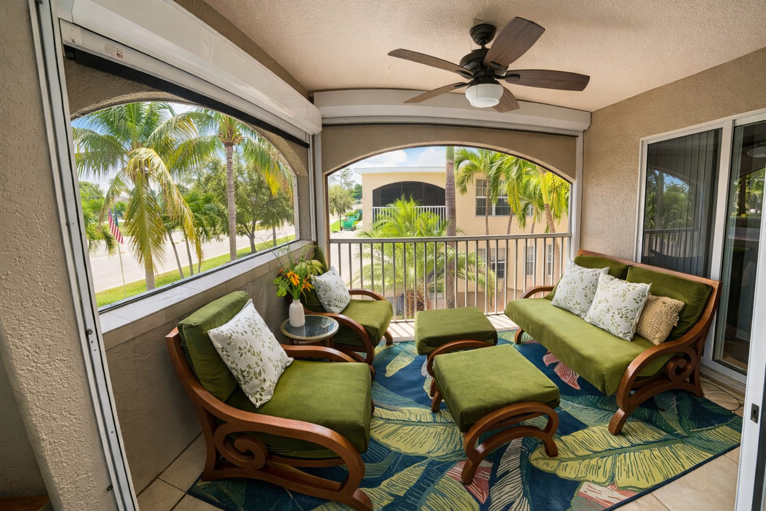Screened lanai with palm views